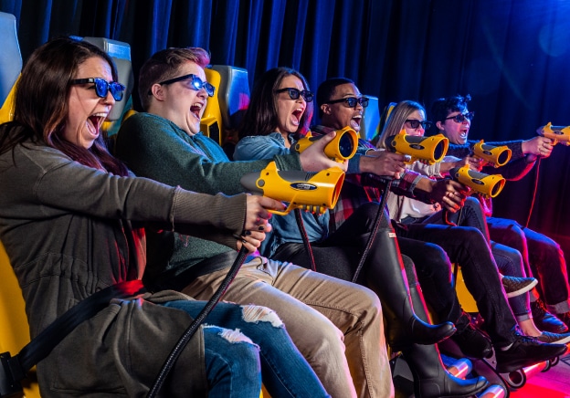 Group of adults on the XD Dark ride screaming