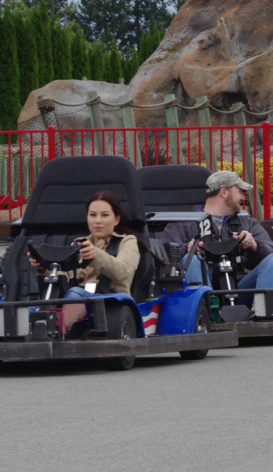Families racing on the Go Kart track